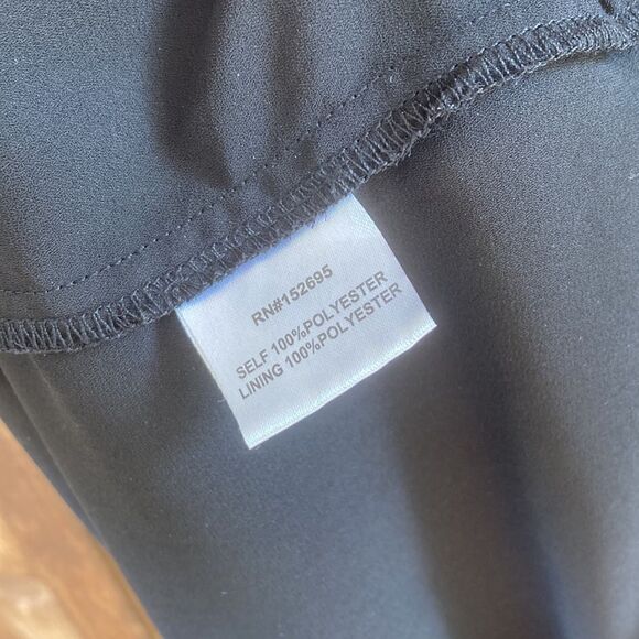 Q&A V-neck Wrap Ruched Clip Textured- Swiss Dot Mini Ruffle Dress in Black - Picture 8 of 11